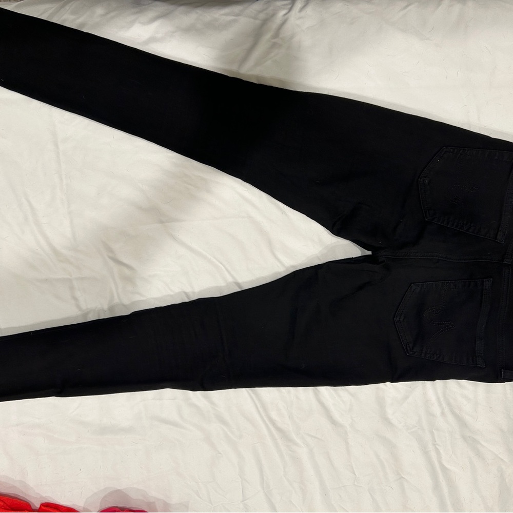 AG black demon cut jeans